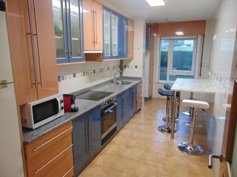 Apartamento Con Jardin ซานติอาโก เด กอมโปสเตลา ภายนอก รูปภาพ